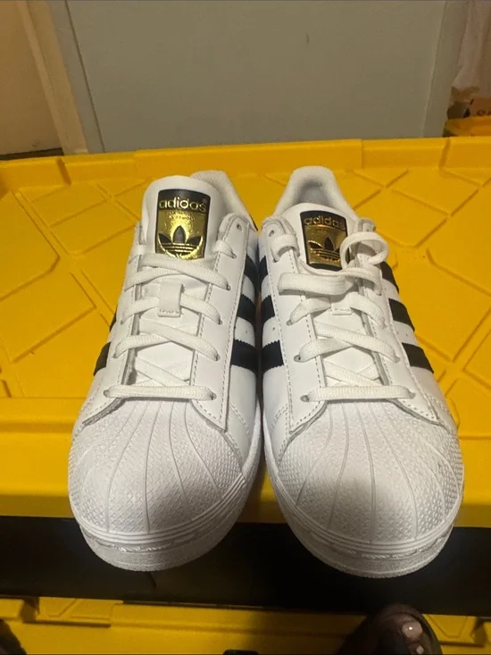adidas Kids White Sneakers with Black Stripes and Gold Tongue Logo