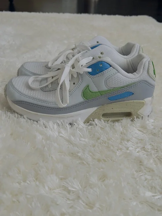 Nike Air Max 90 sneakers in white with blue and green accents