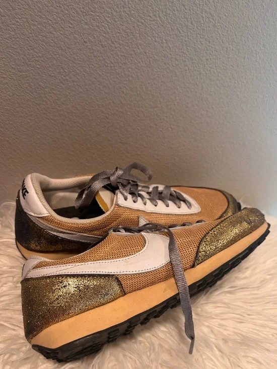 Nike Women’s Metallic Gold Mesh Sneakers