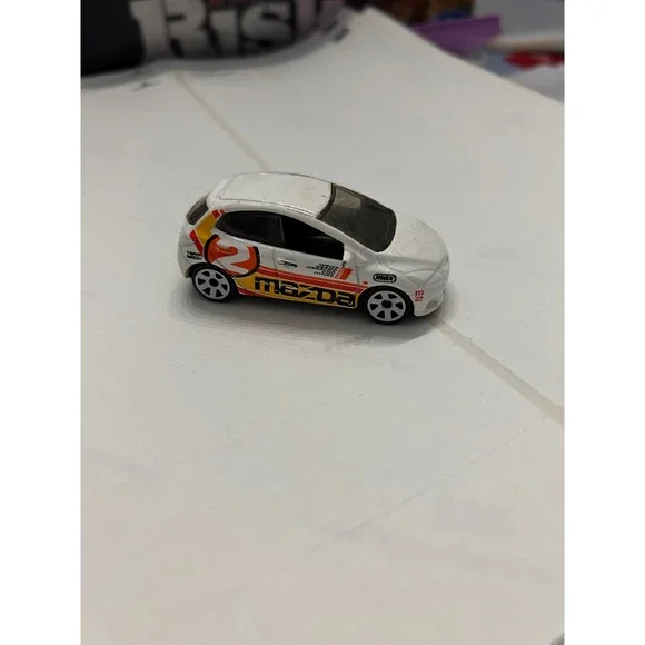 Matchbox 2008 Mazda 2 White Racing Graphics Diecast Car 1:64 Mattel M8762