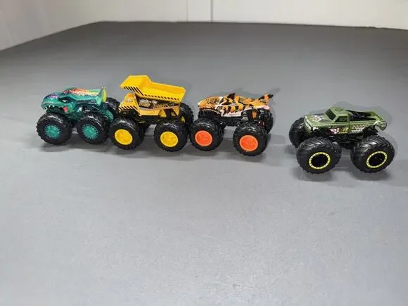 Hot Wheels Monster Jam Trucks,preowned lot of 4