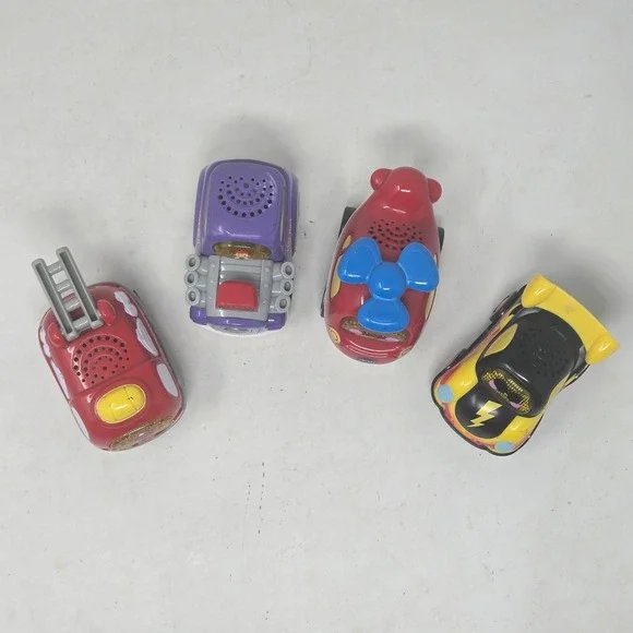 VTech Go! Go! Smart Wheels 4 Car Lot Fire Truck Hot Rod Helicopter Race Car