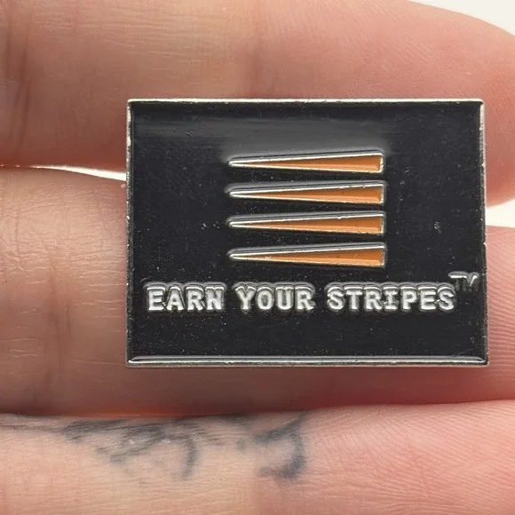 Earn Your Stripes Frosted Flakes Cereal Lapel Hat Pin Kellogg's Black Orange