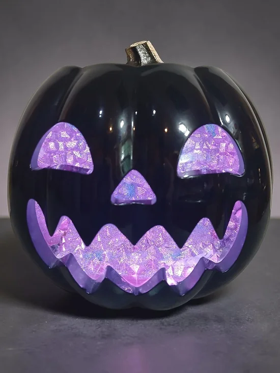 Black LED Jack-o'-Lantern Pumpkin with Purple Glow Candle Holder