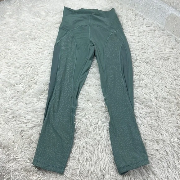Lululemon Nulu and Mesh Mid-Rise Yoga Crop 23