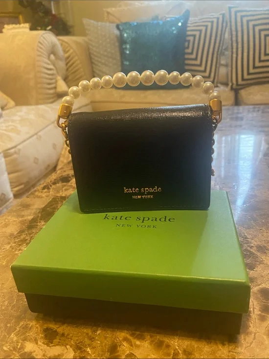 kate spade Black Mini Pearl-Handle Crossbody. The box is included.