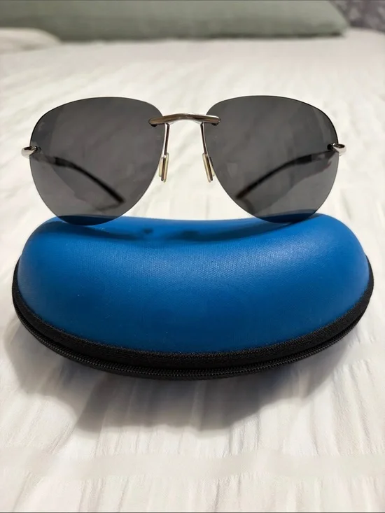 Costa Del Mar Rimless Aviator Sunglasses with Dark Gray Lenses