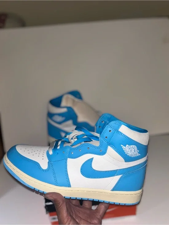 Jordan Air Jordan 1 Mid White and Blue Sneakers