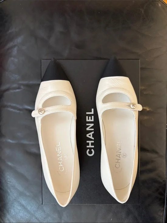 CHANEL Cream Leather Mary Jane Flats with Black Cap Toe