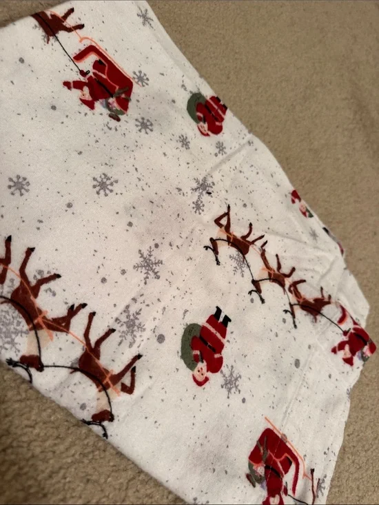 Kids Holiday Santa & Reindeer Flannel Sheet Set - White 100% cotton.