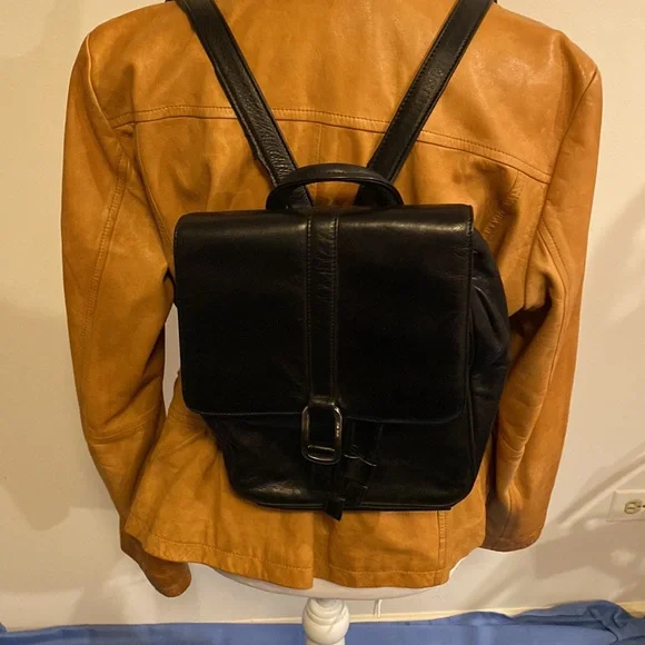 Nine West small genuine leather small backpack.