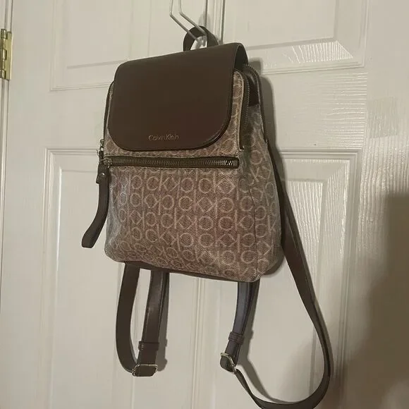 Calvin Klein Tan and Brown Logos  small Backpack logo tone hardwares.