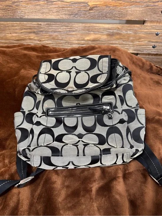 Coach Black and Cream Signature Canvas Backpack with Front Zip Pocket