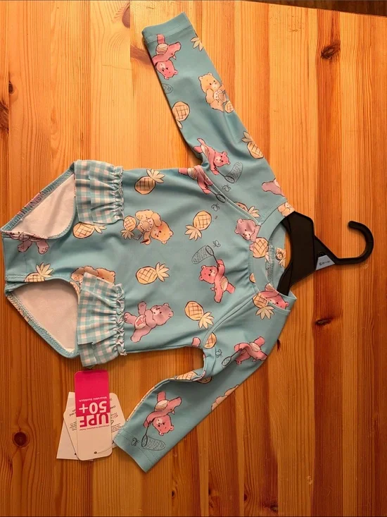 Kids Care Bears Long Sleeve One-Piece Swimsuit in Light Blue with Pineapple Prin