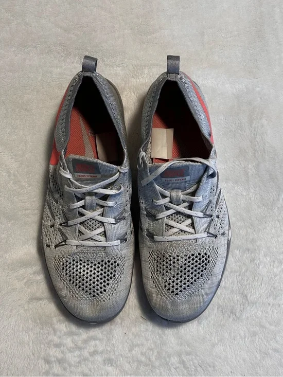 Nike Men's Gray Knit Running Shoes with Coral Accents