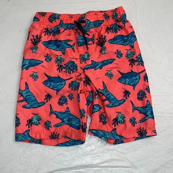 Old Navy coral and teal shark print lined swim trunks