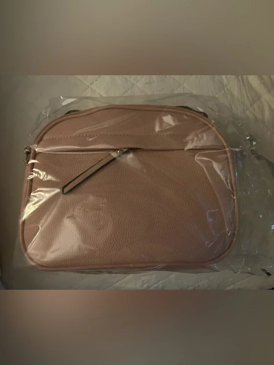 Compact Pink Pebbled purse with Front Slip Pocket and back