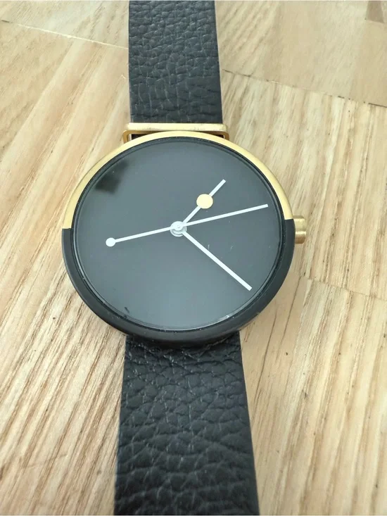 AARK eclipse gold tone and black leather minimalist watch NEW BATTERY