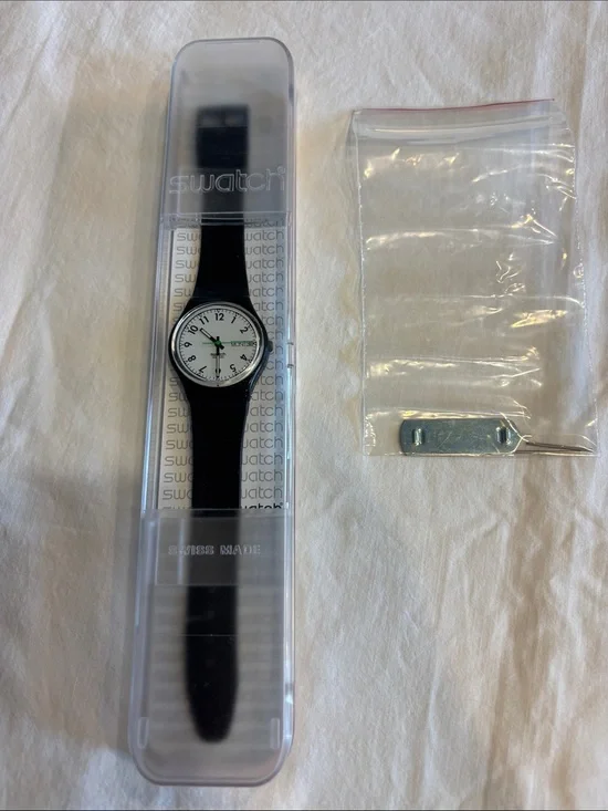 Swatch Men’s Black Strap Watch with White Dial and Green Second Hand