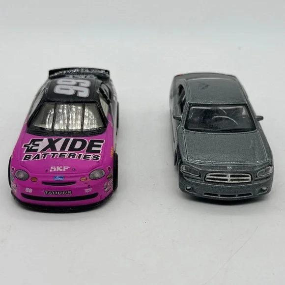 2006 Dodge Charger & #99 Exide Batteries Ford Taurus NASCAR Diecast Cars - Lot 2