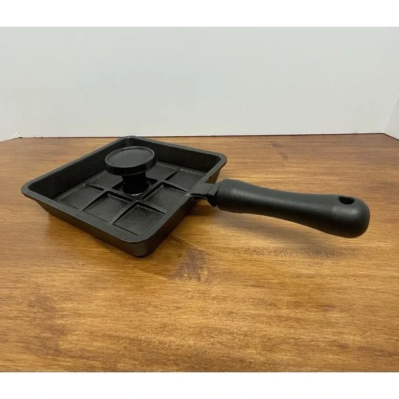 The Norpro Mini Cast Iron Panini Pan with Press, a 5.9-inch Model 653