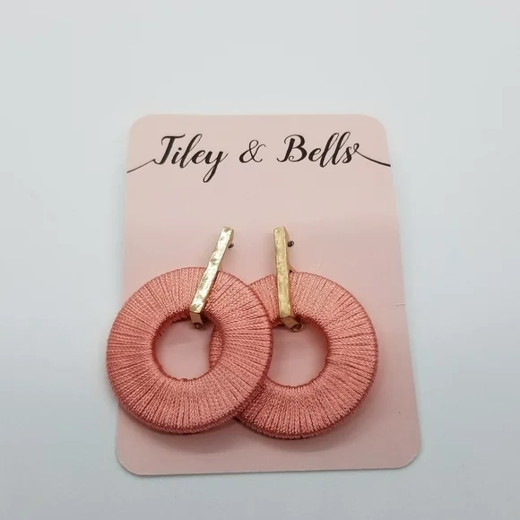 Gold tone bar earrings with pink threaded circles new on card