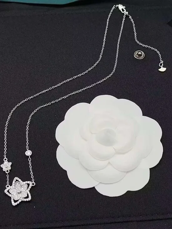 Delicate White Floral Crystal Necklace in Silver Tone