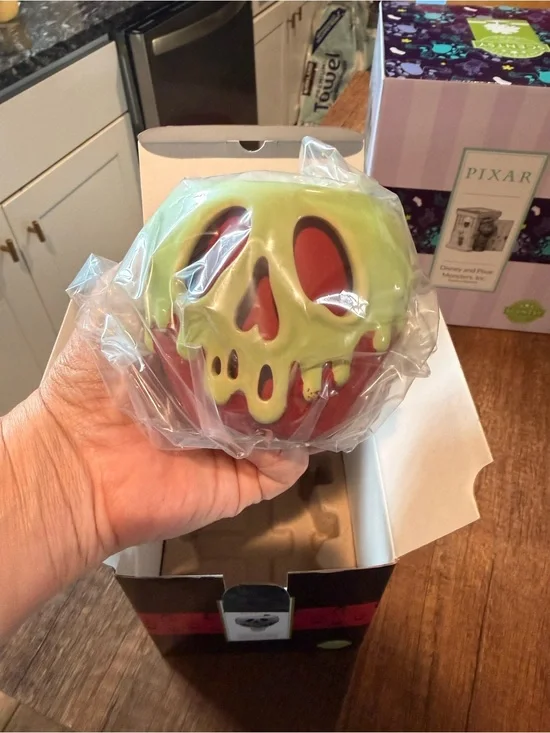 SOLD Just one bite glowing apple warmer