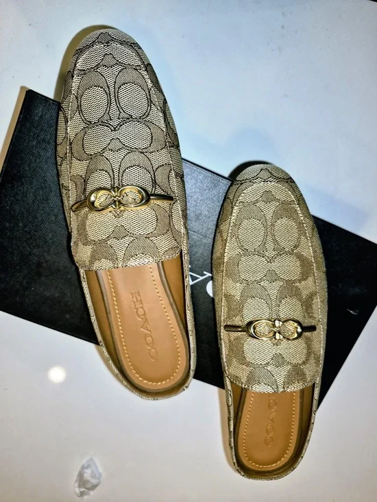 Coach women’s Khaki Signature Canvas Slip-On Loafers with Gold Accent