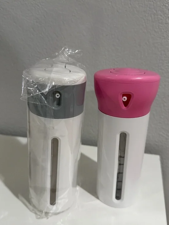 4-in-1 travel dispenser bottles Gray And Pink