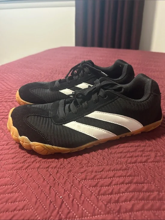 Black barefoot-style sneakers