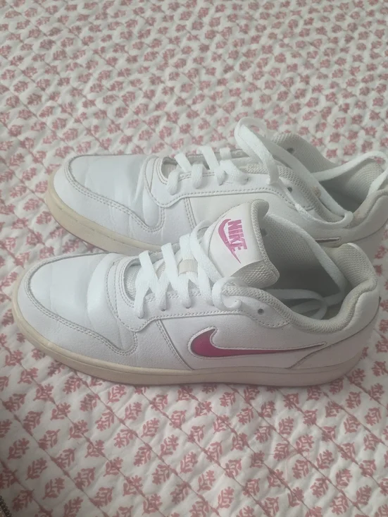 Nike Women’s White Sneakers with Pink Swoosh