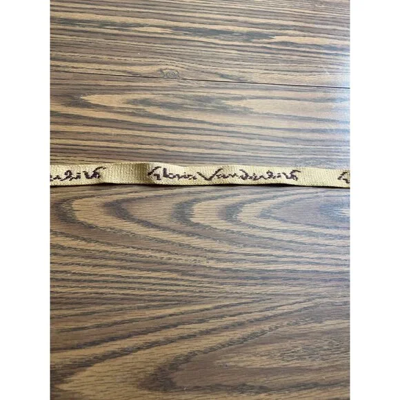 Gloria Vanderbilt logo tan stretch belt with gold tone buckle vintage