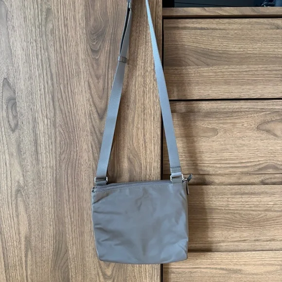 Tumi voyageur tula crossbody bag
