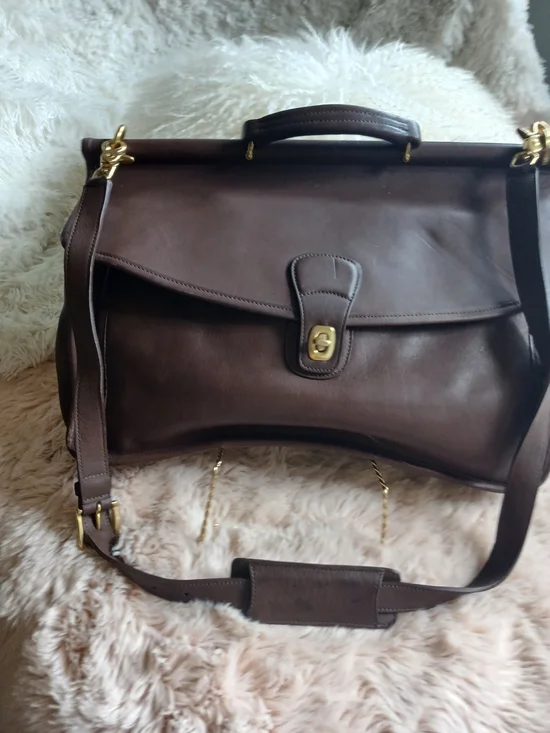 Classic Brown Leather Messenger Bag with Gold Hardware Coach.