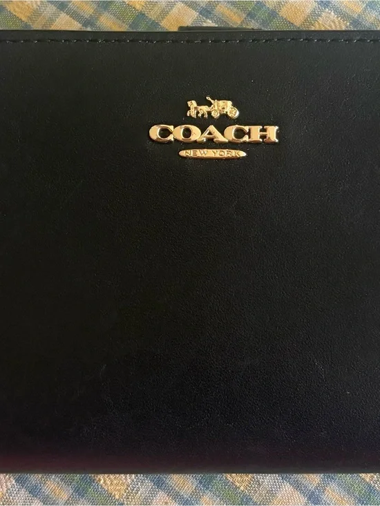 Coach Black Leather Bi-Fold Wallet with Gold Logo Accent