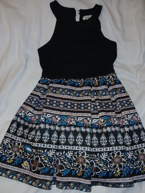 Pre-loved Girl's Black Halter-Neck Dress with Floral Patterned Skirt.
