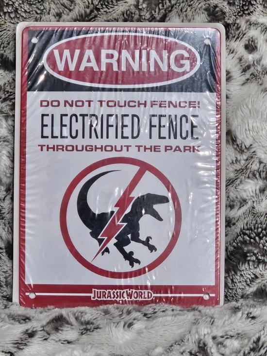 Jurassic World Loot Cate Metal Sign