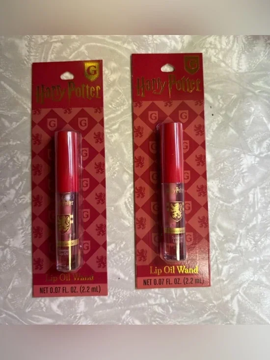 2 Warner Bros. Harry Potter Gryffindor pomegranate Lip Oil Wands