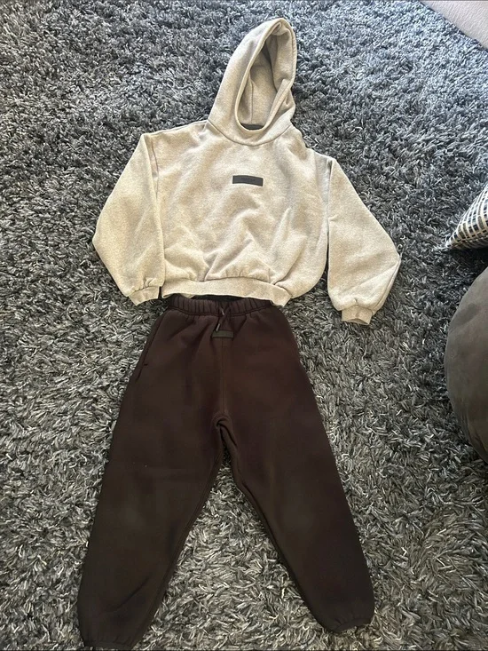 Fear of God Essentials kids Hoodie & Joggers Set in Black and Light Gray