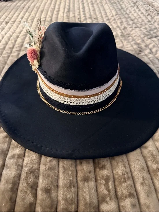 Black Wide-Brim Fedora with Decorative Band and Floral Accent