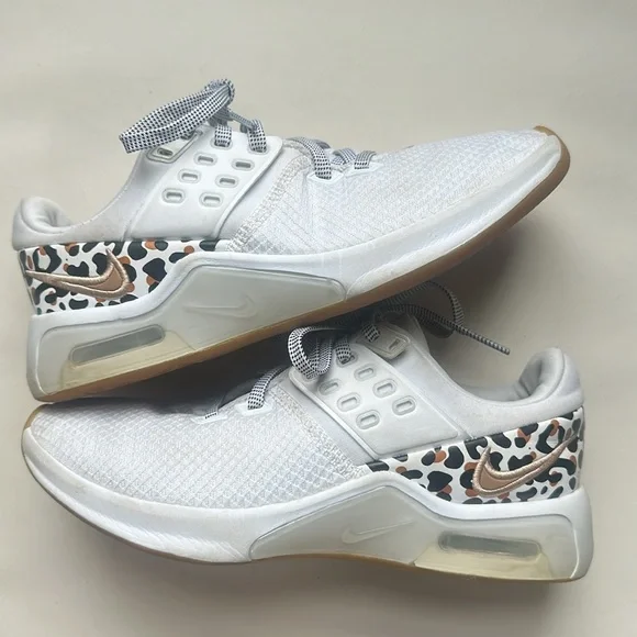 White Nike air max shoes, size 5 with gold Nike embroidering/cheetah print heal