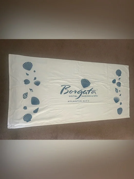 Borgata casino Atlantic City White Beach Towel with Blue Shell Motif
