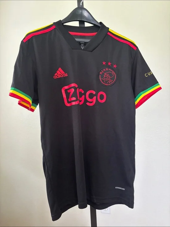 adidas Kids Black Ajax Jersey with Red Logos and Rasta Trim