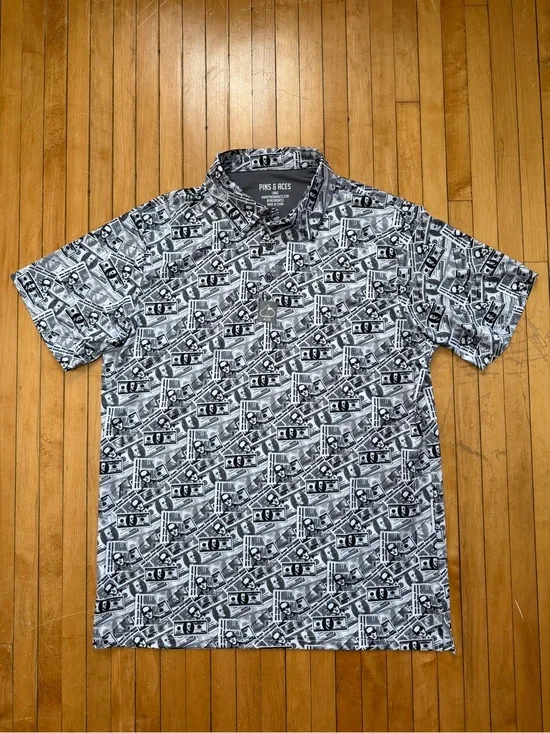 NWOT Pins & Aces DB Cooper Golf AOP Money Dollar Polo Black/White Men’s Sz. L