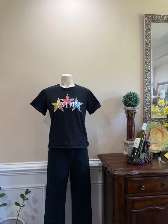 AMIRI Black Crewneck Tee with Multi-Color Star Graphic