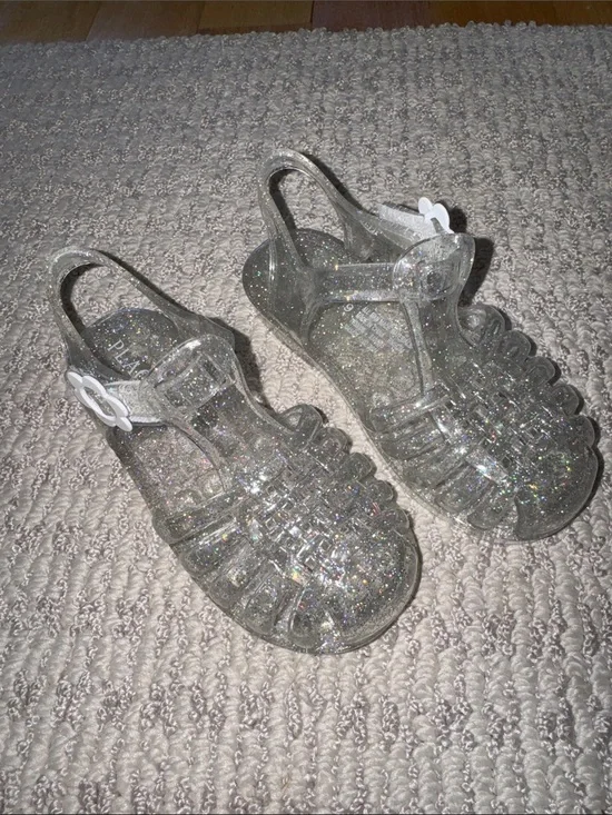 Children’s place Clear Glitter Jelly Sandals with White Flower Buckle