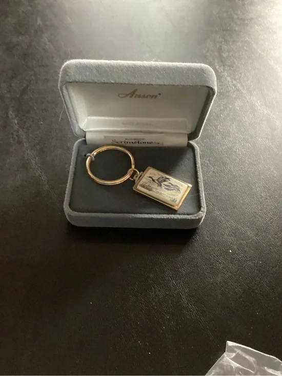 Gold-Tone Rectangular Locket Keychain with Bird Engraving