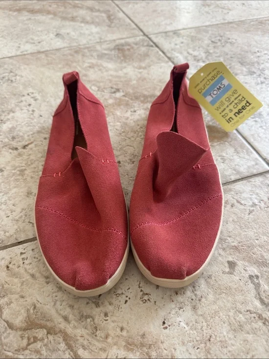 TOMS Women's Slip on sneaker style in Rust colored Red Suede