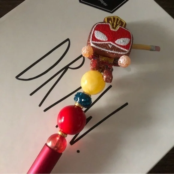 Marvel Gingerbread man handmade beaded pen: Ms. Marvel Glitter